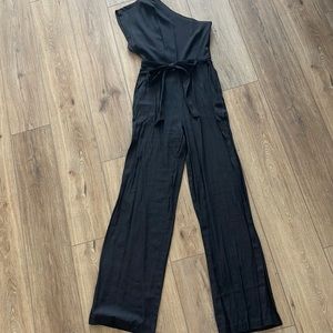 One sleeve, wide leg jumpsuit. Black.